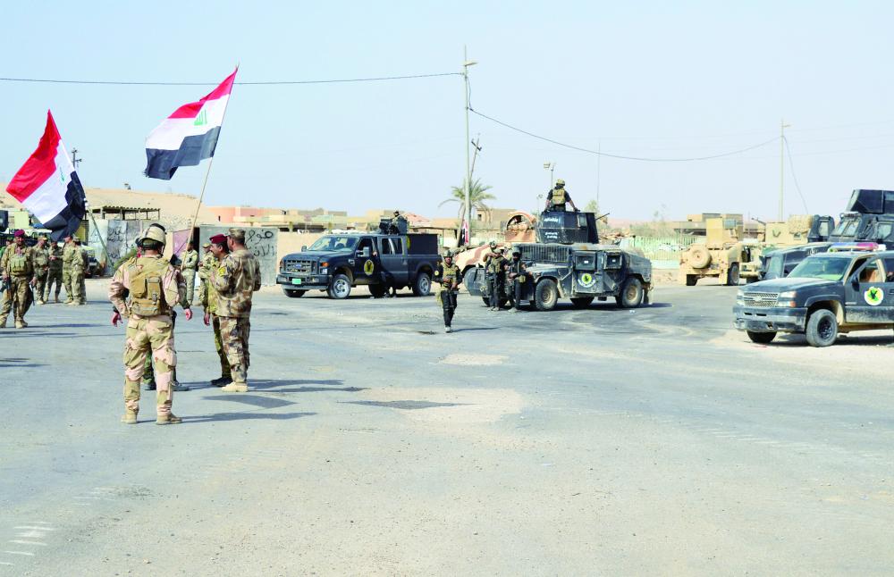 العراق يطهر آخر بلدة من داعش - صحيفة مكة