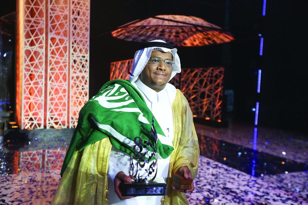 سلطان السبهان يحتفل بالعلم السعودي (مكة)