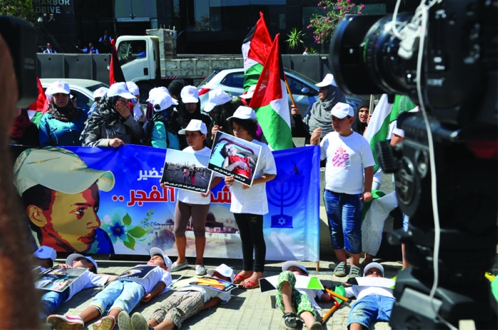 أطفال فلسطين في لبنان يعتصمون تضامنا مع غزة - صحيفة مكة